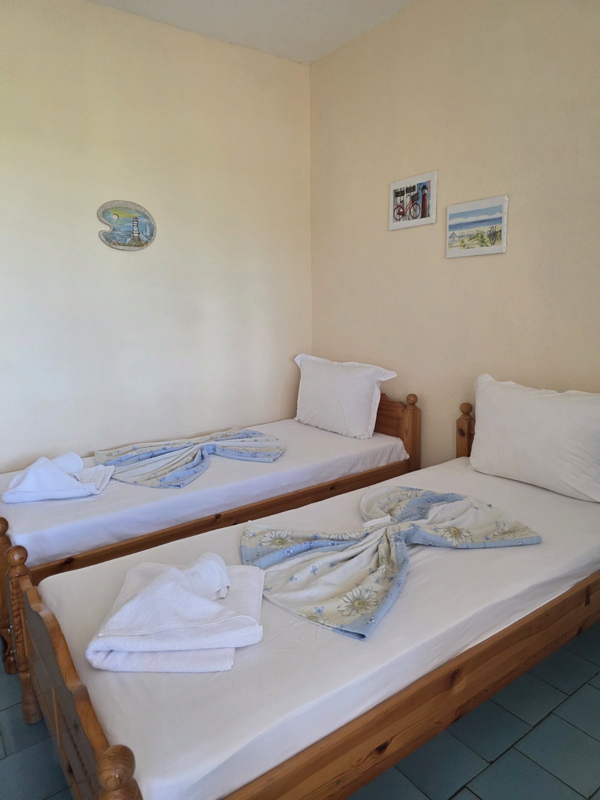 Twin beds in pine frames